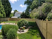 <b>Custom Vertical Board Pressure Treated Fence with Dado Custom 6 x 6 Posts-Mid Rail and Cap Rail</b>